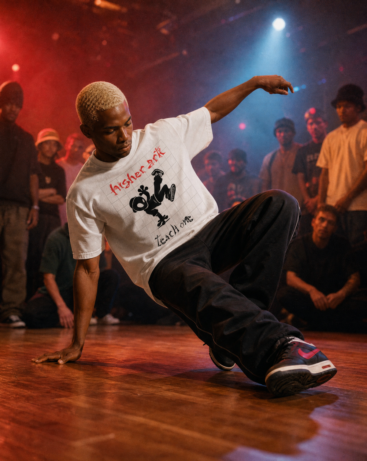 B-boy wearing the Higher Ark Each One Teach One graphic tee in a breakdance cypher