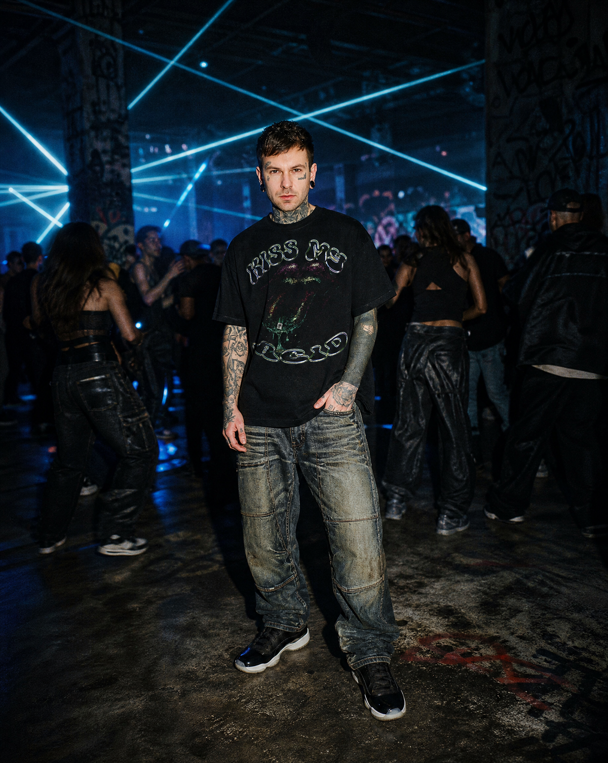Model wearing the Higher Ark Kiss My Acid vintage washed graphic tee in an underground rave setting