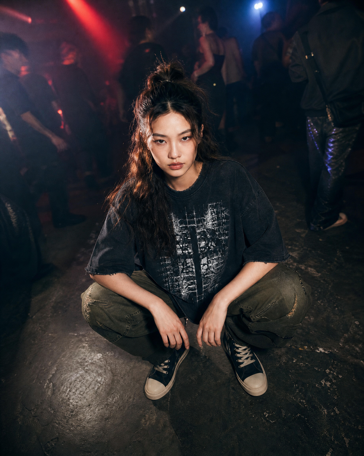 Model wearing the Higher Ark Organik vintage washed graphic tee in an underground rave setting