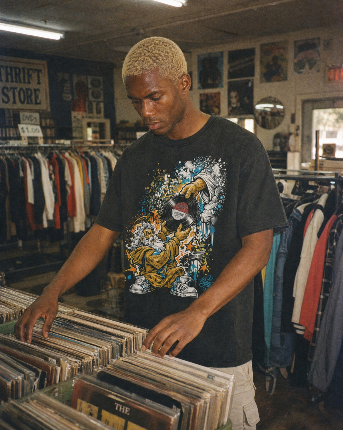 Model wearing the Moses vintage washed graphic tee by The Higher Ark